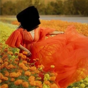 Elegant burnt orange photography tulle gown